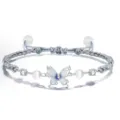 Elegantes blaues geflochtenes Schmetterlingsarmband mit Zirkonia und Perlen für Damen. - Schmetterling-Stil