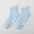 Winter coral fleece grip socks for women, thick warm home sleeping socks with non slip sole. - One Size / Light Blue