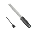 Stainless steel lemon zester and cheese grater with ergonomic handle and cleaning brush. - Fine Grater / Black