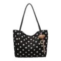 Black polka dot shoulder tote bag with large capacity and stylish design for daily commute. - Black