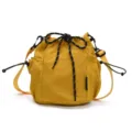 Yellow nylon bucket bag with drawstring closure and mesh side pockets, casual style. - Yellow