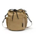 Casual nylon bucket shoulder bag with drawstring closure and mesh side pocket in khaki variant. - Khaki