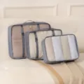 Set of 3 travel storage bags, portable luggage organizers for clothes, shoes, and cosmetics. - Gray