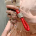 Portachiavi con orsetto in strass scintillante con cinturino intrecciato rosso per borsa auto - Rosso Misto