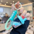 Cute liquid quicksand water cup keychain with watermelon charms and rabbit pendant for bags. - Milk Tea Cup - Watermelon