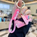 Pink liquid quicksand keychain detail, cute boba cup bag pendant and strap charm. - Milk Tea Cup - Peach