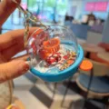 Creative mini finger basketball keychain toy, capsule shape with hoop and cute cartoon pattern. - Lake Blue Orange Basket No Sound Light