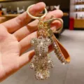 Portachiavi carino orsetto in cristallo strass brillante con cinturino pelle borsa charm oro - Cachi misto