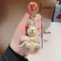 Cute rhinestone rabbit keychain with plush tail and bow tie, perfect bag pendant gift. - Light Yellow