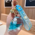 Cute floating liquid rabbit ice cream keychain, stylish silicone strap bag pendant gift. - Blue