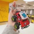 Detailed close-up view of creative mini off-road car keychain bag pendant gift - Red