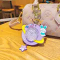 Creative colorful projection starry sky rabbit keychain and atmosphere light detail view. - Purple
