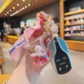 Cute floating liquid lamb keychain with pink flower strap for lovely car keys gift. - Pink Water Straw Cup Sheep
