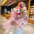 Schöner rosa Acryl Flüssigkeit Gießkanne Schlüsselanhänger mit tollem Glitzer Anhänger - Rosa