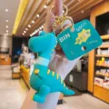 Cute dinosaur telescopic keychain detail shot, showing flexible neck and silicone texture. - Telescopic Neck Dinosaur - Dark Green Light Blue Neck