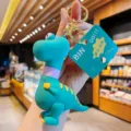 Cute cartoon dinosaur keychain with telescopic neck, silicone decompression toy bag pendant. - Telescopic Neck Dinosaur - Dark Green Purple Neck