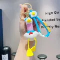 Cute stretchy neck duck keychain with fried egg pendant and sailor design, decompression toy. - Sailor Long Neck Duck - Purple Neck