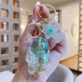 Holografische ruimte konijn sleutelhanger met bloem hanger schattige hars tas hanger. - Blauw Konijn