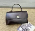 Vintage bruine lederen kussen handtas, elegante schoudertas voor dames voor dagelijks gebruik. - Chocolade