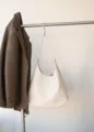 Minimalist white leather shoulder bag, versatile hobo tote handbag for women daily casual. - Ivory