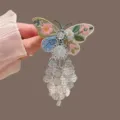 Elegante horquilla de mariposa con bordado exquisito y colgantes plateados para mujeres. - Pinza de Mariposa Borla Color Plata