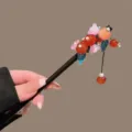 Traditional Chinese style wooden hair stick with red persimmon beads and tassel charm. - Pink Flower Persimmon Tassel Wooden Hair Stick