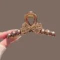 Brown rhinestone pearl bow hair claw clip for elegant women styling, large size variant. - Round Bead Bow Claw Clip (Six Pearls) / 11cm