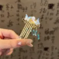 Exquisite gold butterfly hair comb with blue tassel pendants, elegant Chinese style hair accessory. - Gold / Blue Butterfly Crystal Pendant Hair Comb