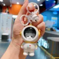 Cute astronaut keychain with a sweet cat inside, perfect bag pendant and stylish key holder gift. - Astronaut - Gold Panda