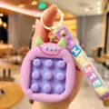 Silikon Monster Push Pop Bubble Fidget Spielzeug Schlüsselanhänger Detail für Tasche. - Lila