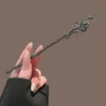Dark metal snake hair stick with green cat eye stone, retro gothic hair fork variant accessory. - Gunmetal Snake Rose Flower