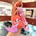 Leuke cartoon zeemeermin sleutelhanger met paarse siliconen band en gedetailleerde personage hanger. - Paarse Zeemeermin