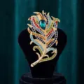 Elegant peacock feather brooch with colorful rhinestones and green teardrop crystal for women. - Gold Base Pave Rhinestone Green Main Stone Peacock Feather Style (825079)