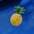 Karpitsa ananas me prasina stixia emagi kai lampera kitrina stras se xryso. - Στυλ Ανανάς (XD8353)