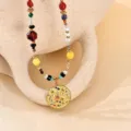 Chic multi-color beaded gemstone necklace with textured gold coin pendant for daily wear. - Multicolor Beaded Gold Coin Style (NE925037)