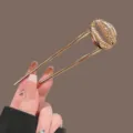 Gold U-shaped hair fork with cute shell design, elegant metal hair stick for buns. - Gold Scallop Style