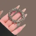 Schitterende strass haarelastiek met metalen hanger voor elegante dagelijkse kapsels - Grijs