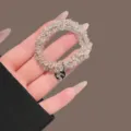 Kristalen kraal haarband met metalen hanger, elegante haaraccessoires voor vrouwen. - Wit
