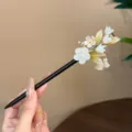 Elegant Chinese style lily of the valley wooden hair stick with floral tassel accessories. - Green