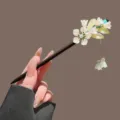 Chinese style wooden hair stick with white floral design and elegant hanging tassels. - Green Lily of the Valley Tassel Wooden Hair Stick