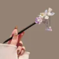 Chinese style wooden hair stick with purple floral tassels, elegant variant design. - Fresh Flower Tassel Wooden Stick / Purple