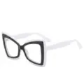 Oversized cat-eye reading glasses with striking black and white contrast frame design. - C1 White Frame / +1.00 Diopter