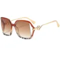 Gafas de sol cat eye oversize de moda con lentes marrones degradadas y patillas de metal chic. - C7 Marco Carey Lente Té