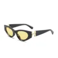 Chique retro cat-eye zonnebril met zwarte monturen en gouden H-scharnieren voor dames. - C3 Zwart Frame Gele Lens