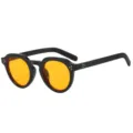 Occhiali da sole ovali neri retro con lenti gialle e dettagli in metallo alla moda - C3 Montatura Nera / Lente Gialla