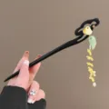 New Chinese style retro hair stick with elegant tassel and cute bird design for daily wear. - Cloud Jade Rabbit Osmanthus Tassel Wooden Hair Stick