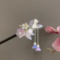 Close-up of Neo-Chinese floral hair stick detail, featuring delicate purple petals and tassel. - Purple Fresh Little Floral Tassel Wooden Hair Stick