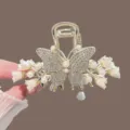 Elegant lily of the valley hair claw clip with rhinestones, pearls and tassel design. - Butterfly Tassel Bell Flower / Gold