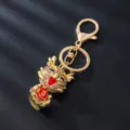 Metal rhinestone cartoon dragon keychain, cute luxury bag pendant and car key ring accessory. - Zodiac Dragon Style