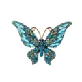 Détail broche papillon strass bleu vintage, élégante épingle revers insecte cristal en métal. - Aigue-marine